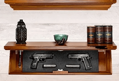 Shelf with hidden compartment and pistols.