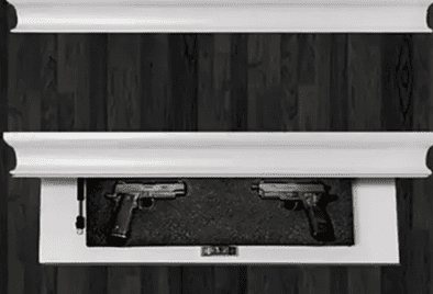 Hidden compartment with two pistols inside.