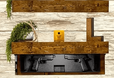 Hidden firearm shelf with decorative items.